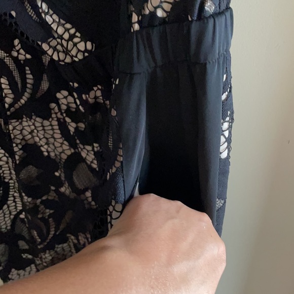 DVF SHANY BLACK LACE JUMPSUIT 6. Bought on Poshmark but it sadly does not fit. - Picture 9 of 12